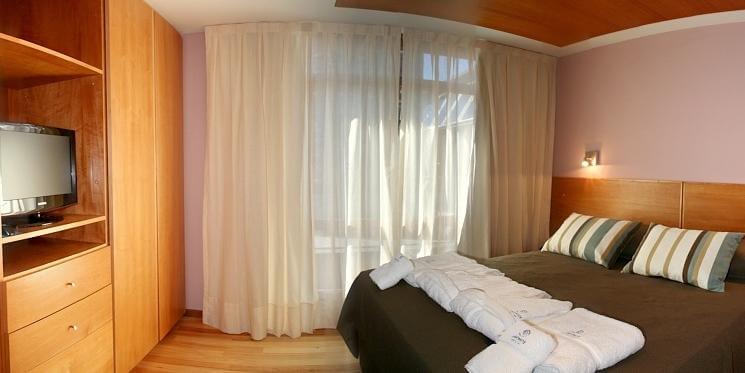Foto da cama do quarto - San Martin de Los Andes