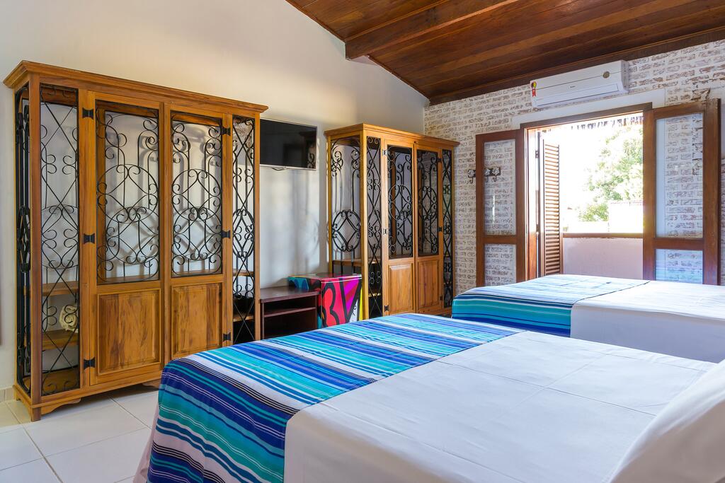Pousadas em Ubatuba pé na areia: Hotel Village Enseada