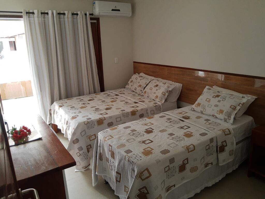 Quarto simples em pousada em São Miguel dos Milagres com duas camas 