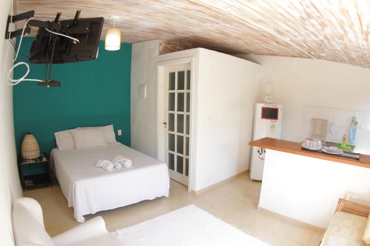 Cômodo com quarto e cozinha em Maresias
