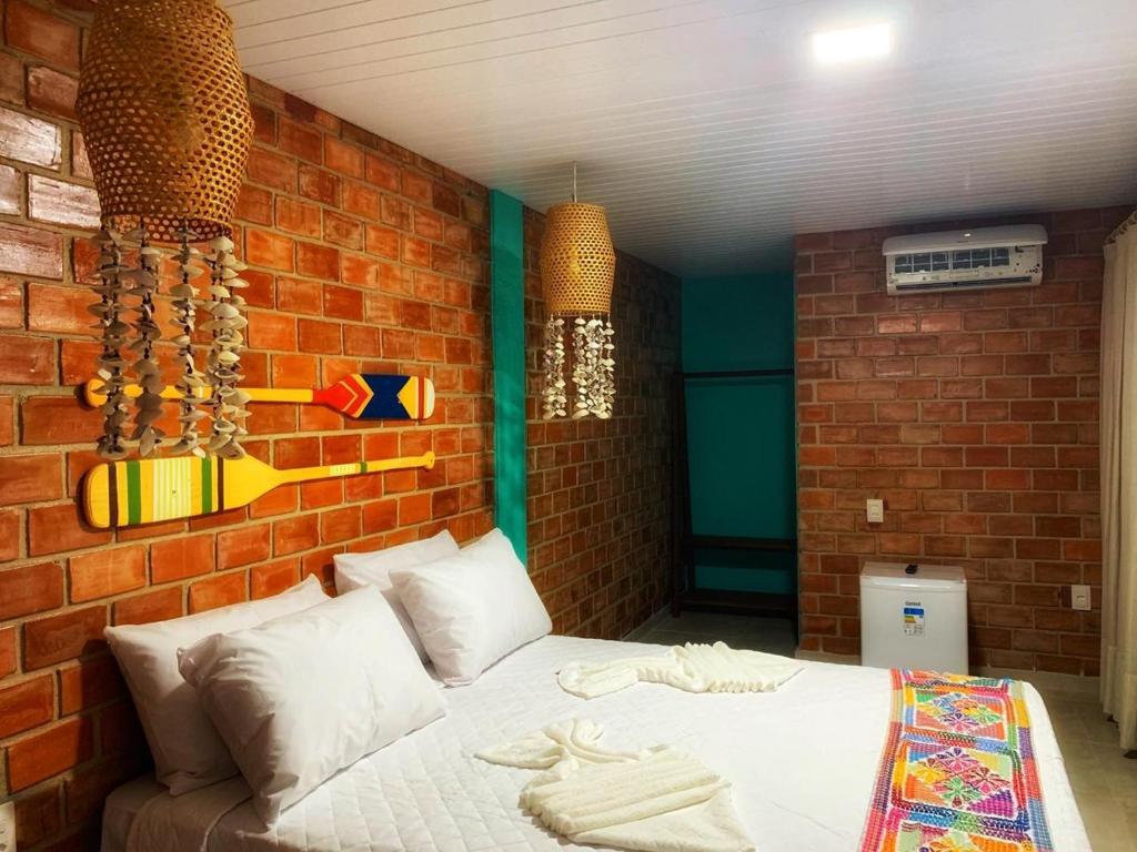Quarto com decoração rústica e praiana em Porto de Galinhas