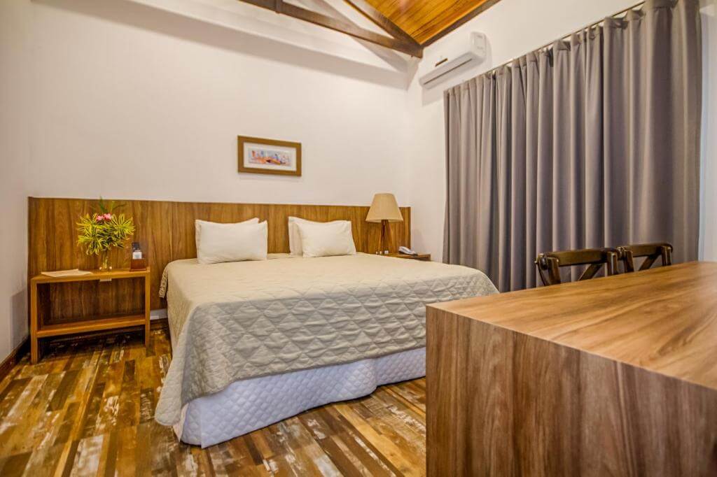 Quarto rústico e elegante em hotel em Aracaju