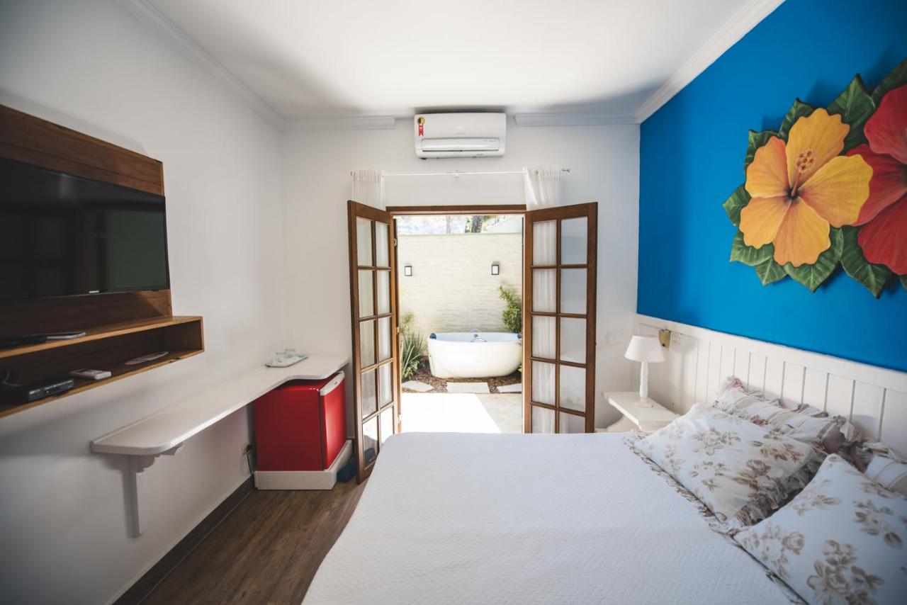 Quarto de casal com decoração praiana
