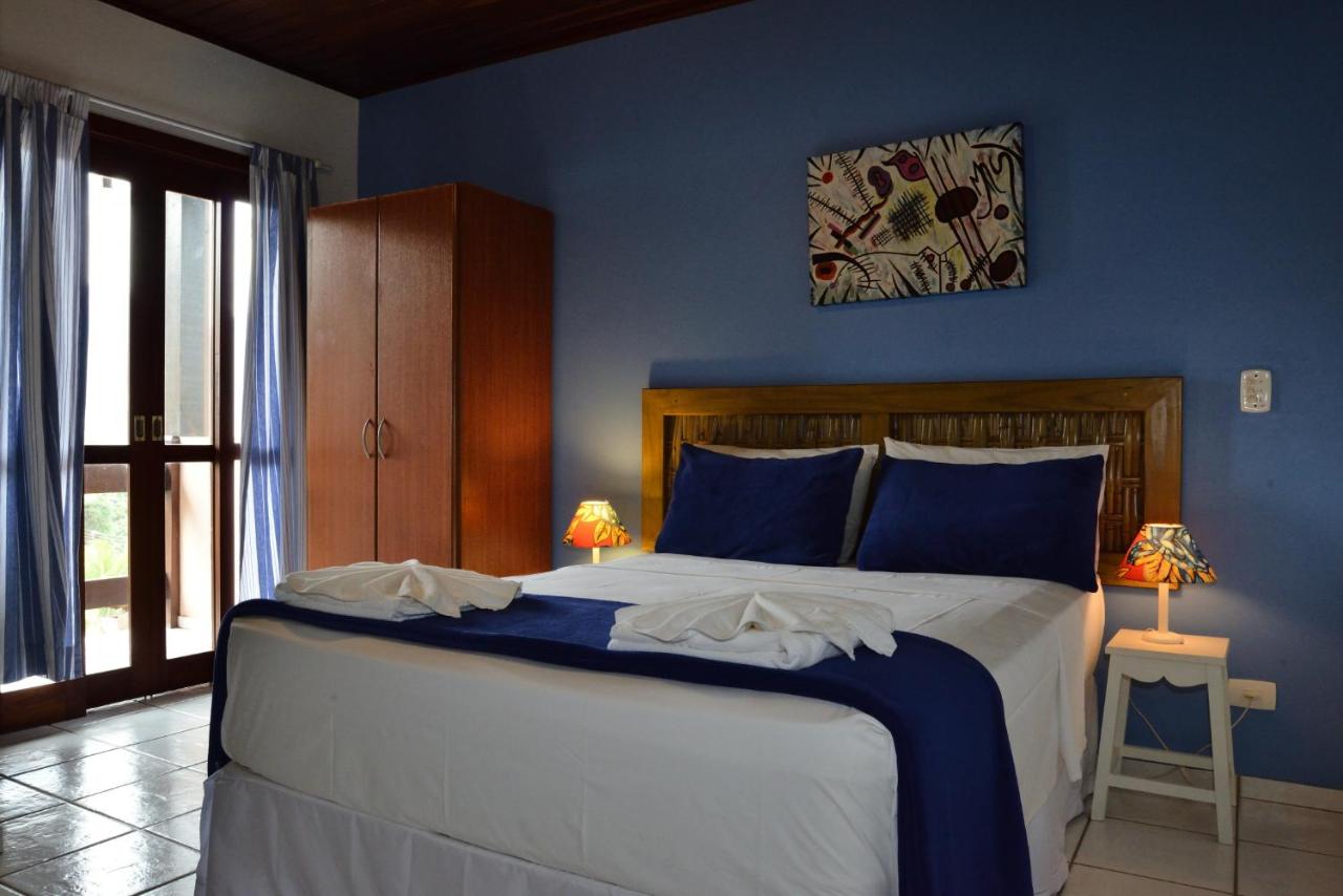 Quarto com cama de casalem pousada em SP