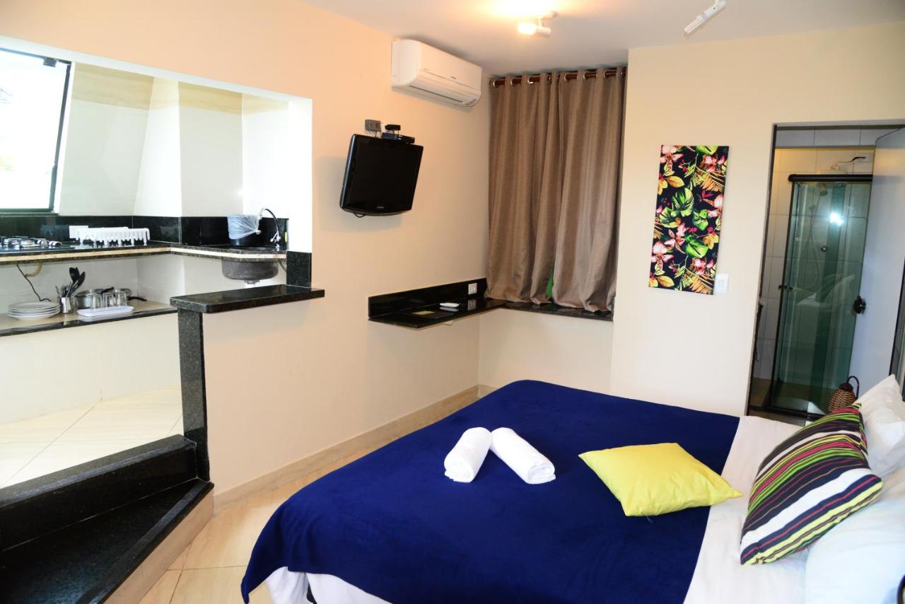 Quarto de casal com cozinha em pousada no litoral norte de SP