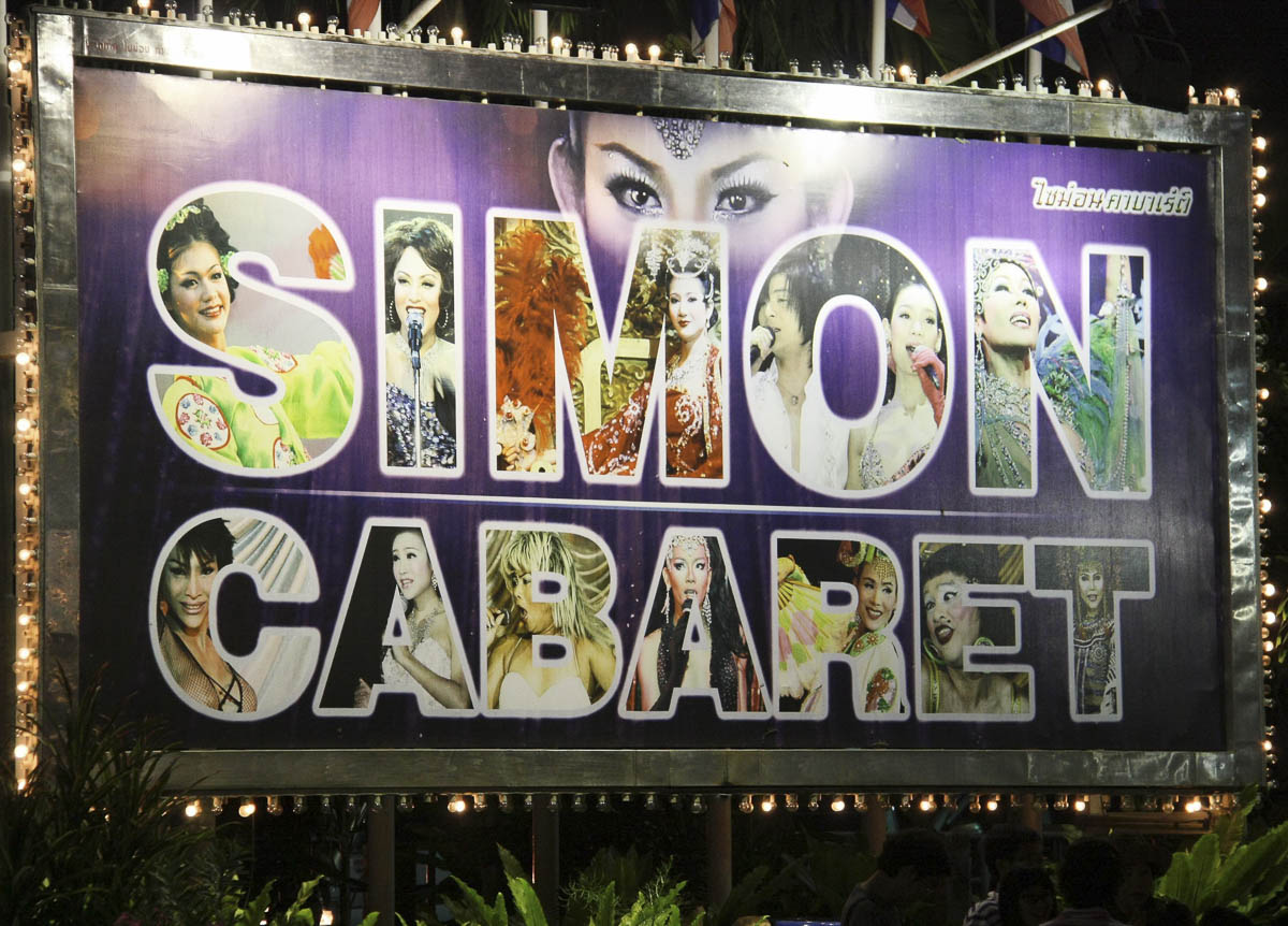 Cartaz roxo com o nome 
