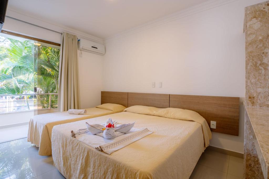 Quarto do Portal Village Praia Hotel Rede Soberano em Porto Seguro.