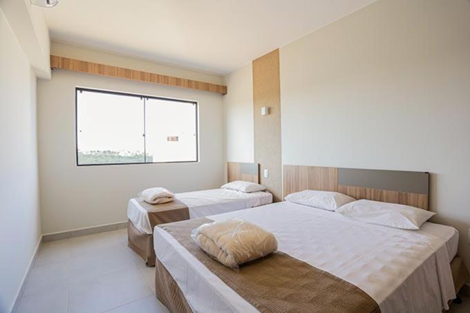 Quarto do Praias do Lago Eco Resort by WAM Experience, em Caldas Novas.