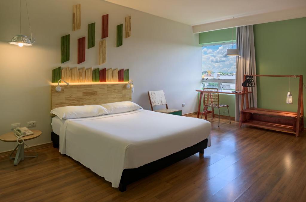 Quarto do Hotel Nacional Inn Curitiba Santa Felicidade, em Santa Felicidade, Curitiba.